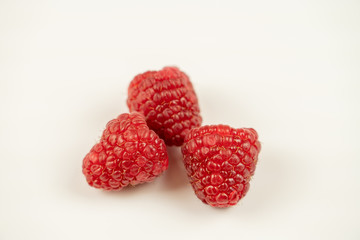 Wall Mural - raspberries isolated on white background