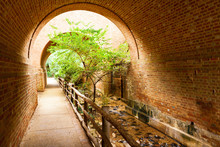 The Pathway Under Bridge Arch At Williamsburg