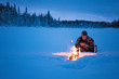 © Johnér - Woman camping at winter
