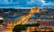 Panoramic night sight in Rome with Saint Peters Basilica, as seen from the Castel Sant'Angelo terrace.