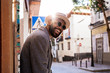© Santi Nunez/Stocksy - Portrait of stylish african man