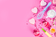 Valentine Day Cooking Baking Background. Utensils And Ingredient For Sweet Valentine Cakes And Heart Shaped Cookies, Wooden Background Copy Space