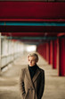 © Alexey Klementiev/Stocksy - Portrait Of Young Blond Androgyne Woman On The Street
