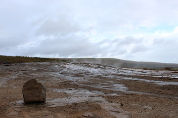 The original geysir in Iceland on a cloudy day