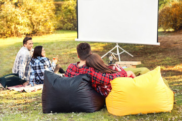 Sticker - Friends watching movie in outdoor cinema