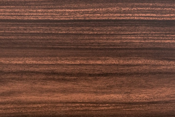 Texture of a wooden surface or board brown or chestnut color for background