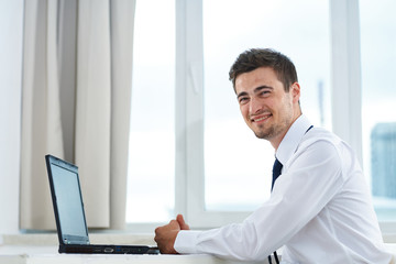 businessman working on laptop in office