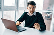 © SHOTPRIME STUDIO - businessman working on laptop in an office