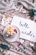 Hello winter composition. Hot chocolate with mini marshmallows and candy cane. Flatlay, Christmas concept