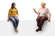 © Ljupco Smokovski - Young and senior woman sitting on a panel and having a conversation
