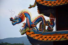 Yilan City, Taiwan - May 12 2017: Close Up Of A Colorful Dragon On An Orange Rooftop Of A Taiwanese Temple