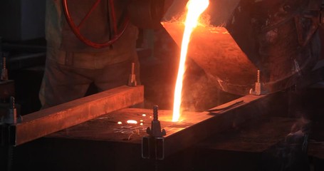 Wall Mural - Smelting of liquid metal from blast furnace into the railway scoop container at the metallurgical plant