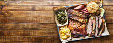 Texas Bbq Platter On Wooden Table In Copy Space Composition