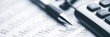 © Philip Steury - Close-up Pen Calculator And Reading Glasses On Financial Report - Business Accounting Concept