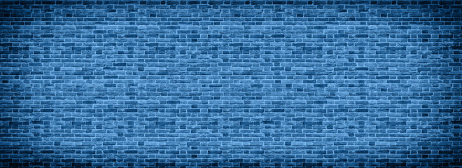 Wall Mural - Panoramic background of wide old Classic blue color of the year 2020 brick wall texture. Home or office design backdrop