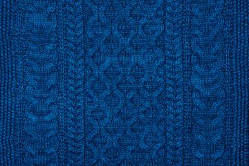 Wall Mural - Dark blue sweater knit textured background.