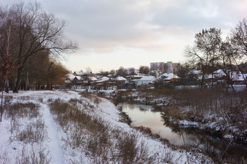 Winter snow park river night landscape. Winter night river in snow city park panorama. Winter snow night park river view