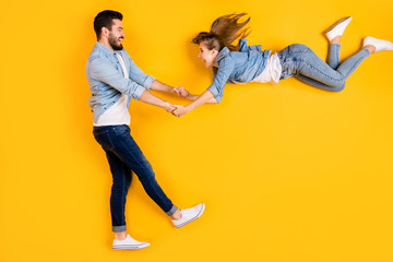 Sticker - Top view above high angle flat lay flatlay lie full length body size view concept of cheerful cheery beautiful handsome spouse having fun isolated on bright vivid shine vibrant yellow color background