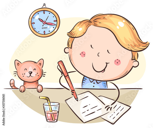 Boy writing a letter or making homework at the desk