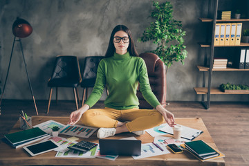 Portrait of her she nice attractive experienced professional girl agent broker meditating training self developing chakra asana energy at modern loft industrial interior work place station