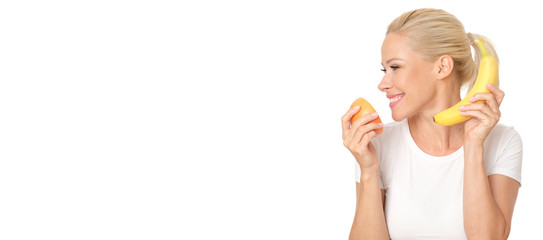 Wall Mural - Blonde model is holding citrus.