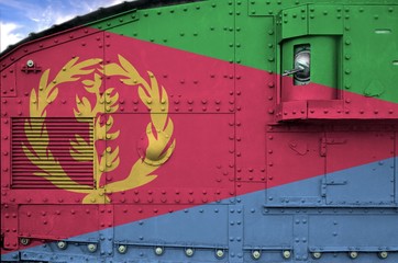 Eritrea flag depicted on side part of military armored tank closeup. Army forces conceptual background