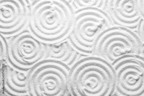 Fotomural White sand with pattern as background, top view