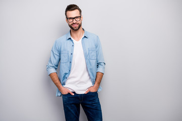 Photo of amazing macho guy perfect appearance neat hairstyle bristle young promoted boss chief easy-going person wear casual denim outfit isolated grey color background