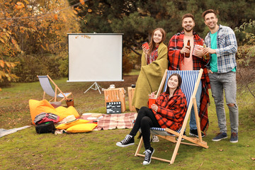 Poster - Happy friends in outdoor cinema