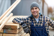© pikselstock - Young male worker in timber warehouse