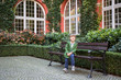 © golovianko - A cute boy in the Ossolineum yard in Wroclaw, Poland