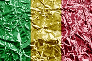 Poster - Mali flag depicted in paint colors on shiny crumpled aluminium foil closeup. Textured banner on rough background