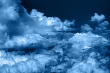 Cloudy Sky Background Toned In Blue.