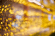  Abstract golden bokeh background texture.