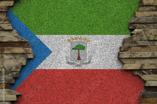 Fotomural Equatorial Guinea flag depicted in paint colors on old stone wall closeup