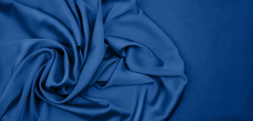 Knitted silk wool texture blue color. full frame background . close up. copy space.
