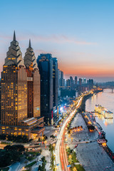 Night view of golden high-rise buildings along the Yangtze River in Chongqing, China