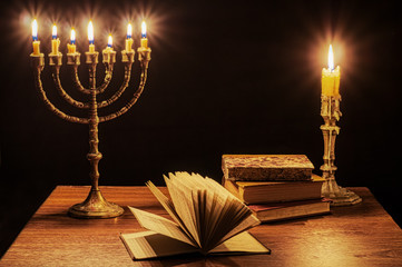Poster - Menorah and candlestick on writing desk.