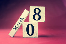 March 8th, Eighth Of March, Day 8 Of Month March - Vintage Wooden Calendar Blocks On Maroon Background With Empty Space For Text