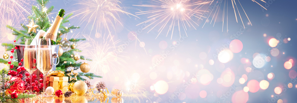 New Year Celebration With Champagne And Fireworks - Golden Lights On Blue Background  - obrazy, fototapety, plakaty 
