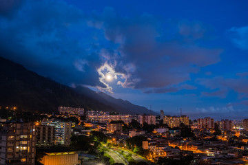 Wall Mural - View of Caracas city  at night from east side. Venezuela