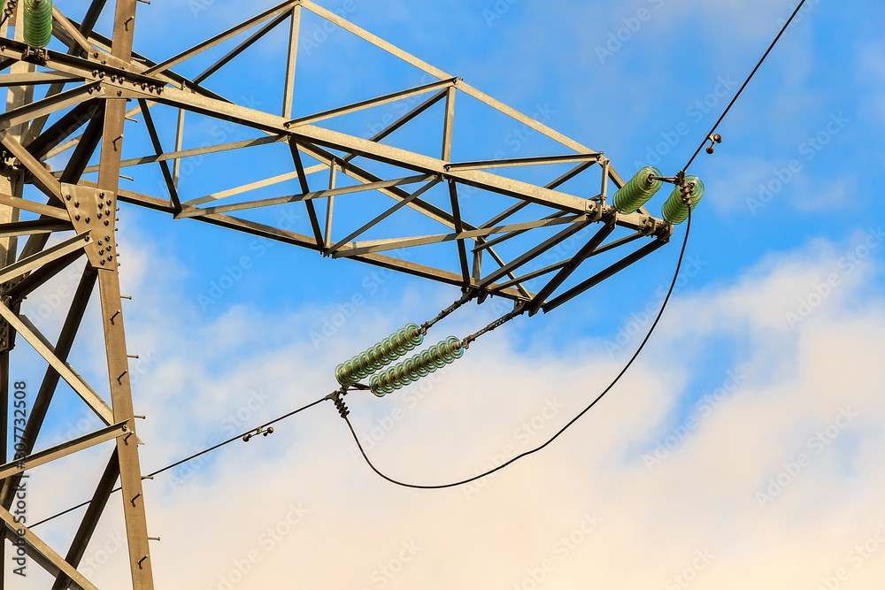 High voltage post or High voltage tower. Power line, insulators and ...