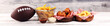 © beats_ - chicken wings, fries and onion rings for football on a table. Great for Bowl Game party