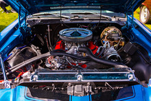 Blue Classic Muscle Car, Open Hood Close Up On Red Engine, Big Chrome Round Air Intake Filter, Tubes, Wires, Pipes, Brake Vacuum Servo, Other Parts