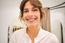Portrait Of Young Beautiful Smiling Woman Happily Looking In Camera