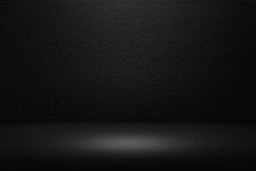 Wall Mural - black background with spotlight to concrete ground in studio for interior display products. dark int