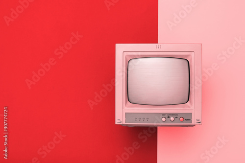 Fotomural Vintage TV with kinescope on a two-tone background.