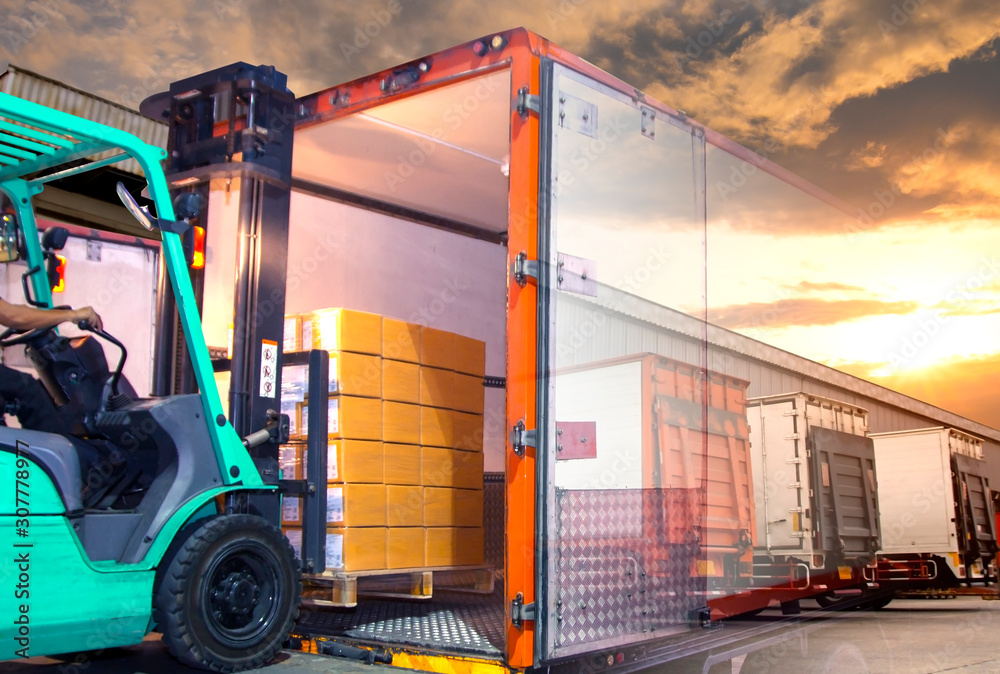Loading Packaging Double Exposure of Forklift Tractor Loading Packaging Boxes into ...