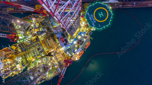 aerial-view-offshore-jack-up-rig-at-night-offshore-oil-rig-drilling-platform