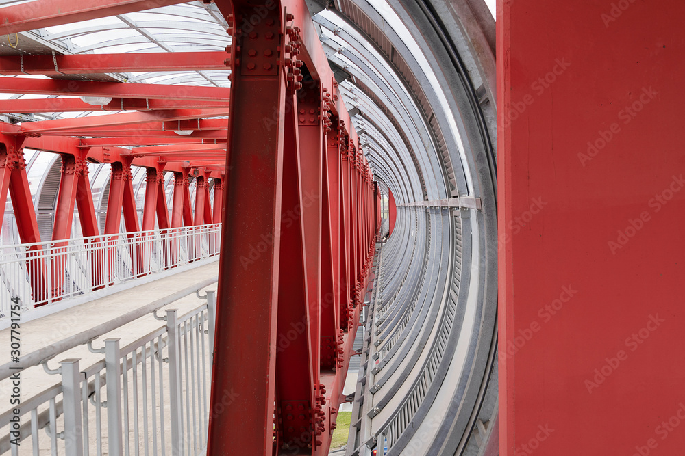 red-iron-beams-fastening-the-crosswalk-the-channels-are-bolted